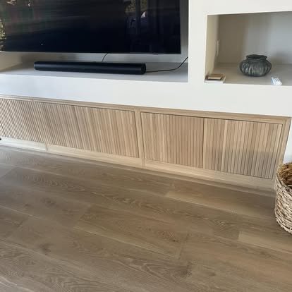Wide plank oak flooring in modern living room