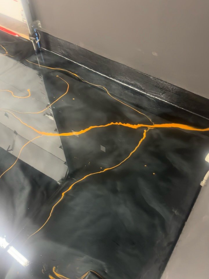 Metallic epoxy garage floor with gold veining