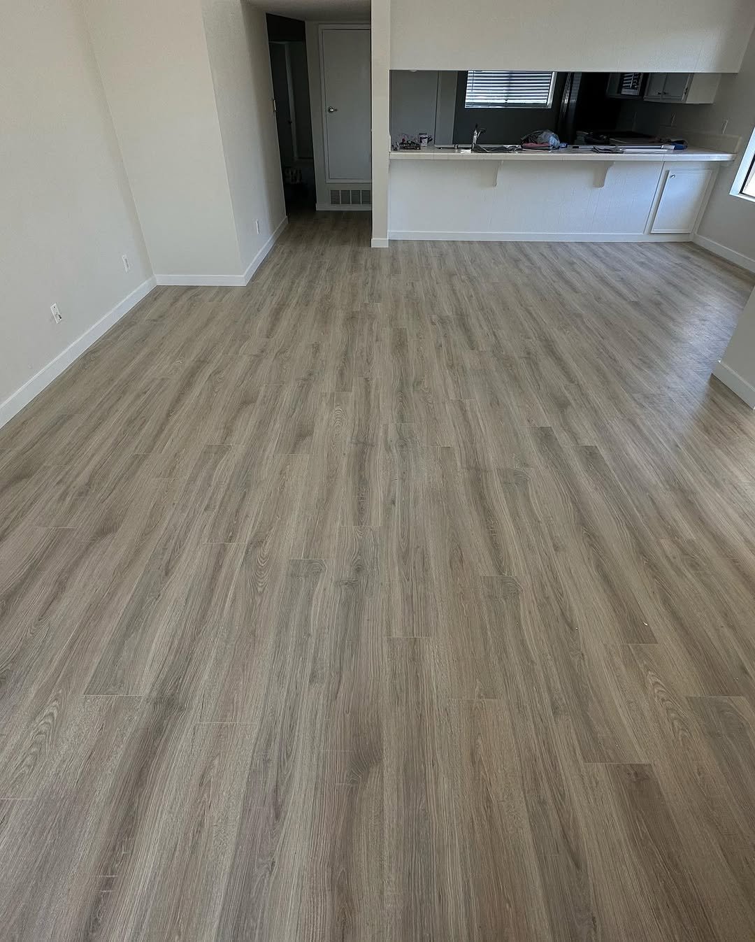 Mohawk Sandcastle Oak laminate flooring in condo